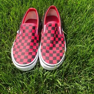 Red and black checkered Vans